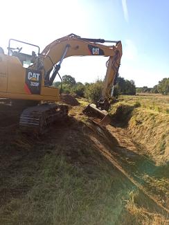 Photo des travaux de retalutage des berges de la Sausse
